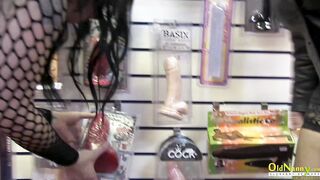 A visit to a sex shop by two busty lesbians