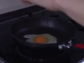 Asian cutie Anri Okita gets fucked in the kitchen by two guys