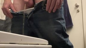 amateur boy in jeans shorts with big hanging balls caught pissing hands free