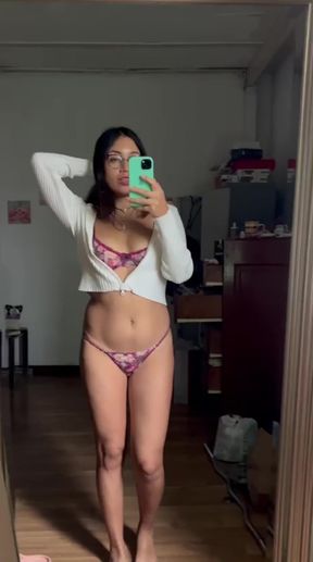 Female in lingerie posing for selfie