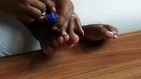 Ebony blue toenails painting by Foot Chicks