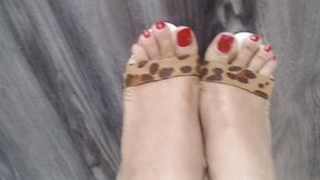 Her stiletto heels dangle from her feet and sway up and down (8)