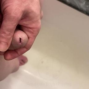 Amateur Boy Pissing, with Close-up and Good Quality Slow Motion of the Load of Pee Coming Out of the Pee-hole (urethra)