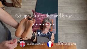 Tickles feet up with feather and paint brush ( French speaking with English subtitles )