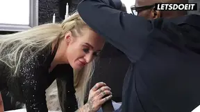 Tattooed blonde gets banged in doggy style