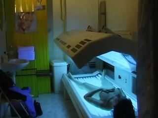 Solo Session with a German Hottie Who Loves to Tan in a Sunbed
