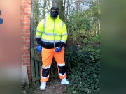 quick pawing off in hi-vis tracksuit and sneakers outdoors