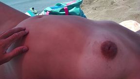 A bit of teasing on the coast. Stepmom jerking off my cock again