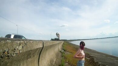 Petite exhibitionist strippin by the lake with risky public nudity