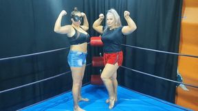 Two big female wrestlers wrestle