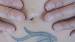 Belly button digging stretching finger'n