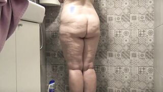 Older big tit fat mom takes a shower.