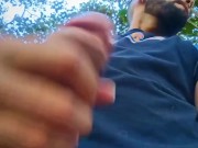 Big uncut cock latino jerking outdoors in the woods and eating his own cum careful not to get caught