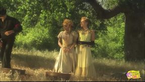 Blondes in the wild west in an open field get naked and have lesbian sex