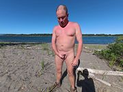 Jerkin off at the public river beach