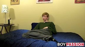 Innocent Elijah plays with a toy and cums right in his mouth