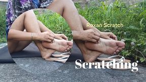 Scratching your feet while sitting on the floor (3)
