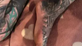 Heavily tattooed and skinny solitaire flaunts her body