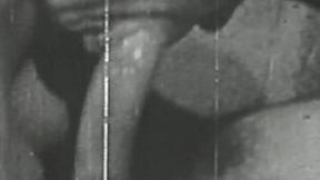 ”Black & white vintage video of lady sucking her lover”