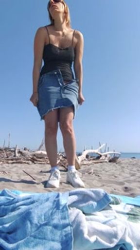Naked by the sea