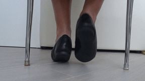 Play of shoes and bare feet under the chair dd