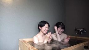 Saucy office lady captures steamy lesbian escapades on sultry hot springs getaway