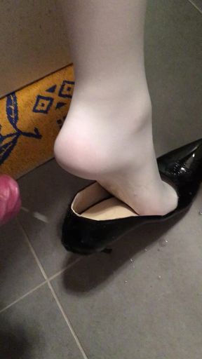 White tights and black pumps