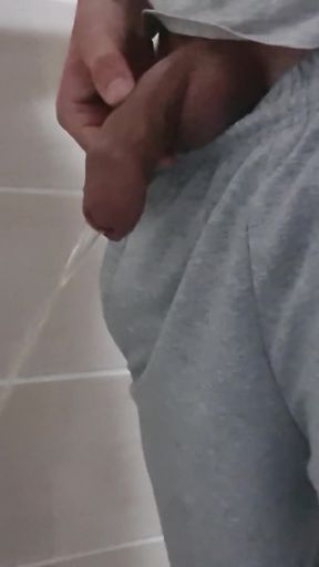 Guy Long Pissing with Uncircumcised Cock and Big Balls