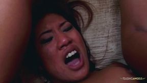 An obedient Asian woman sensually undresses before engaging in passionate anal intercourse