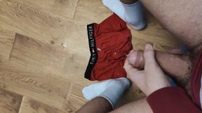 Russian guy jerking off his thick cock and cuming on underpants