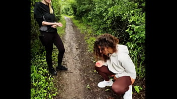 lady ana pisses in front of rebel rhyder in the woodspeeing