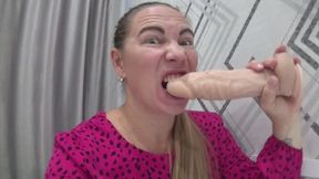 Horny play and biting big dildo with sexy lips a