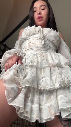 Blonde woman in ruffled dress