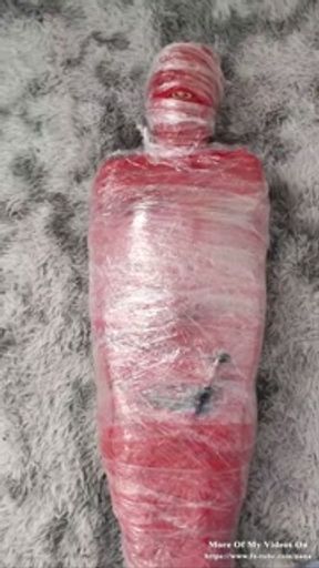 NANA Mummified with red plastic tape and then played with for orgasms