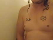 Watching a hot chubby dude play with himself in the shower. (Portrait Mode)