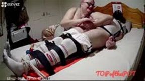 Cock and ball torment on a strapped down footballer