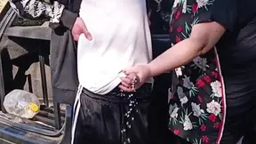 A neighbor holds my dick while I pee and then sucks it in public
