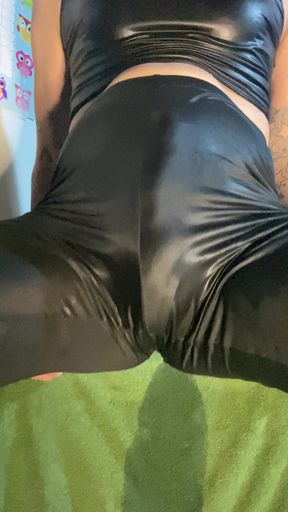 Wet and messy fun in shiny leggings