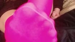 Footplay and toe wiggling in pink stockings