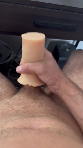 Playing with Toy Under Office Desk