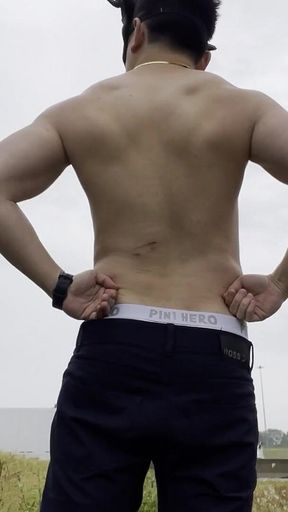 Rain-drenched Highway Exhibitionist: Muscular Stud Strips Naked Amid Rushing Traffic, Flexes, and Explodes in Ecstasy