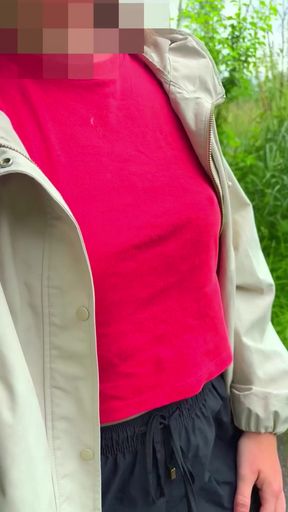 Adult in red shirt and jacket