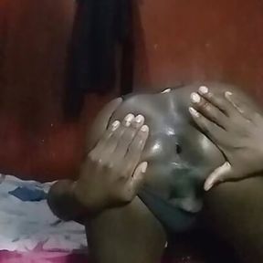 Kenyan crossdresser fingering and spreading her gaping asshole