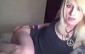 Platinum blonde emo tgirl does a bit of softcore posing
