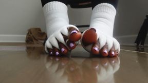 Toe wiggles in white socks