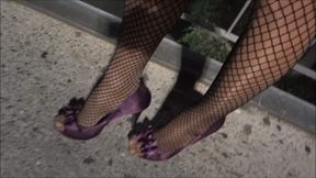In Fishnet stockings outside