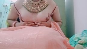 indian gay crossdresser gaurisissy pressing her big boobs and fingering in her clean shaved big ass in red saree