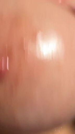 Cumshot on Oily Slingshot Titties