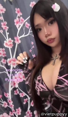 Vietnamese girl in pink and black outfit