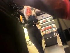 Black guy puts big cock on display in public store